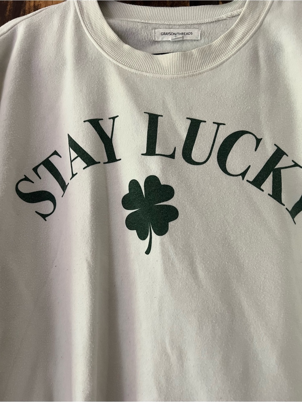 Grayson Threads White Sweatshirt with Dark Green Clover Graphic